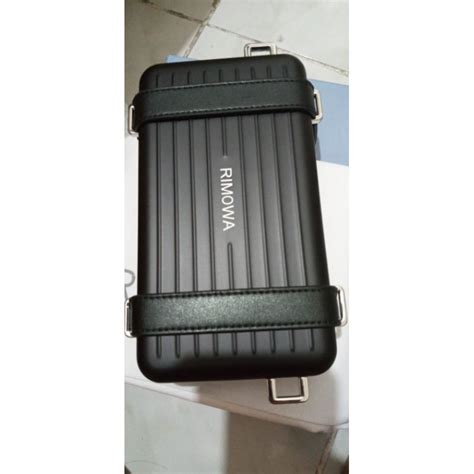 dior rimowa sling bag price